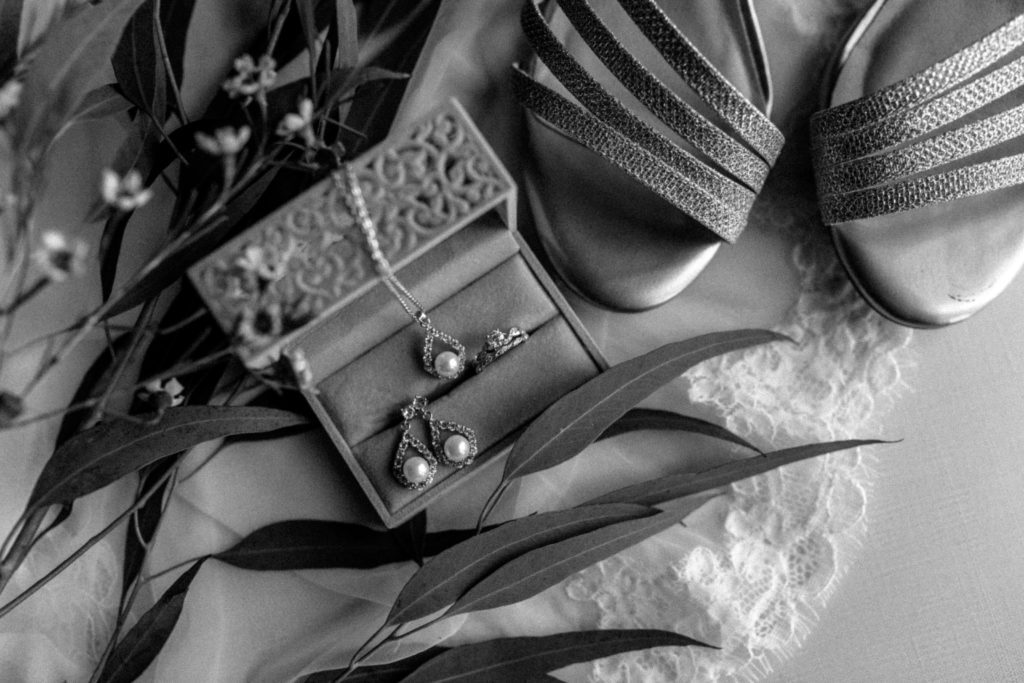 Wedding details in black and white with a delicate jewelry box
