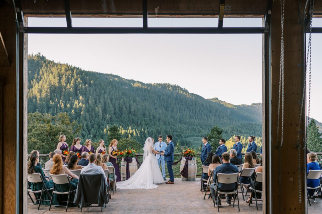 wedding ceremony on the patio at spire mountain cellars